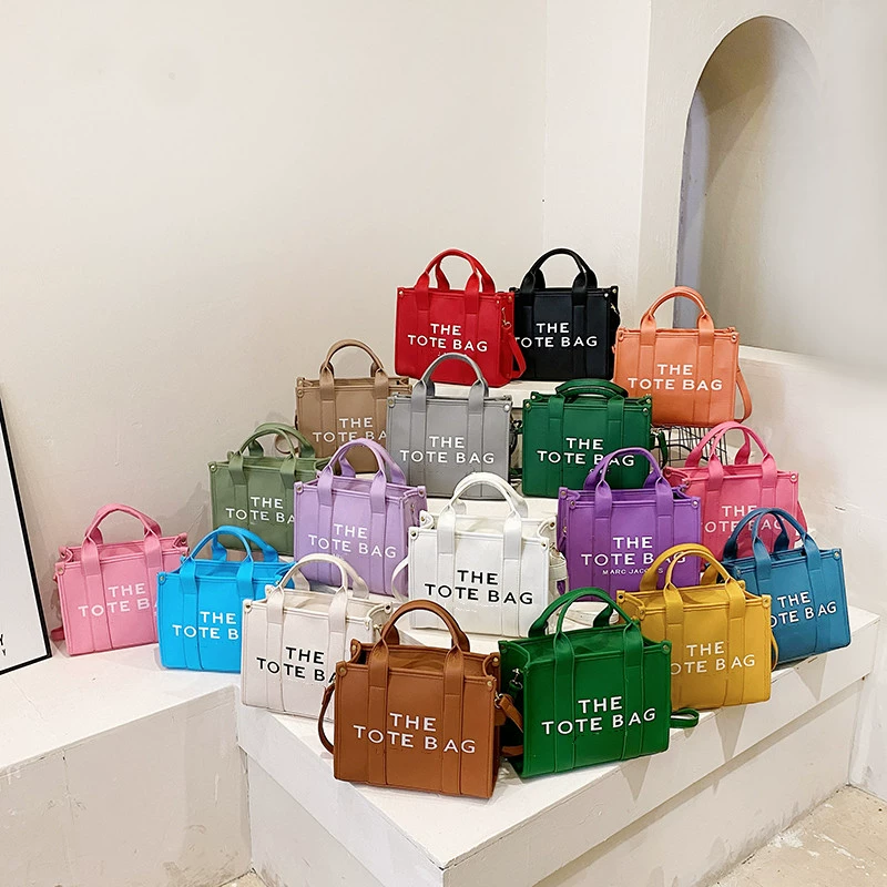 Handheld capacious purse, shoulder bag, one-shoulder bag, city style