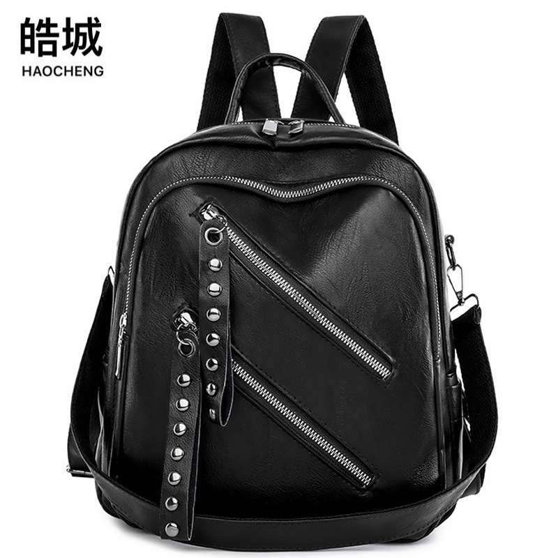 Nueva mochila de cuero suave para mujer casual del sudeste asiático moda remache retro mochila multifuncional de doble uso mochila escolar de moda
