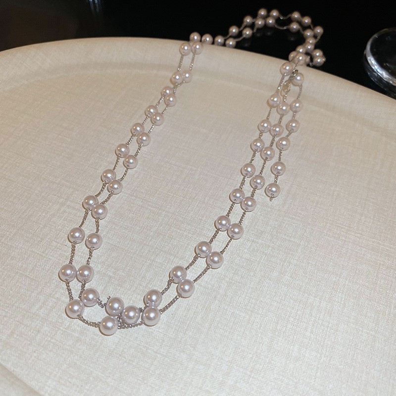 Collar con cuentas de perlas de gota de agua con diamantes transfronterizos otoño e invierno cadena de suéter de lujo ligero francés moda todo fósforo joyería de alta gama