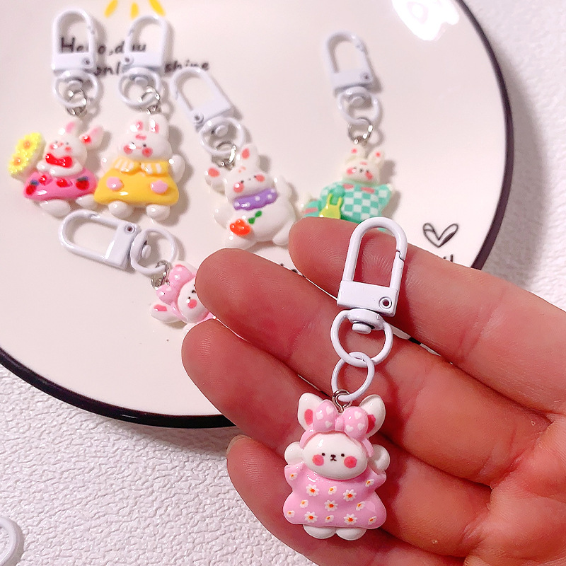 Cartoon verano viaje conejo llavero in dulce chica amiga regalo mochila colgante accesorios de resina, etc.