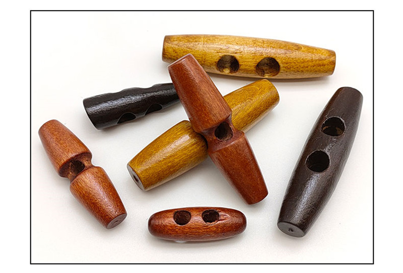 双孔木头橄榄扣 仿牛角纽扣 装饰木质纽扣 (17).jpg