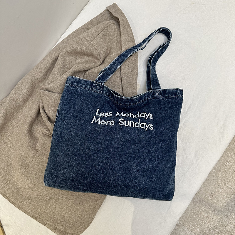 Bolsa de denim casual de gran capacidad para mujeres 2024 nueva bolsa de hombro de viaje, bolsa universitaria ligera y versátil