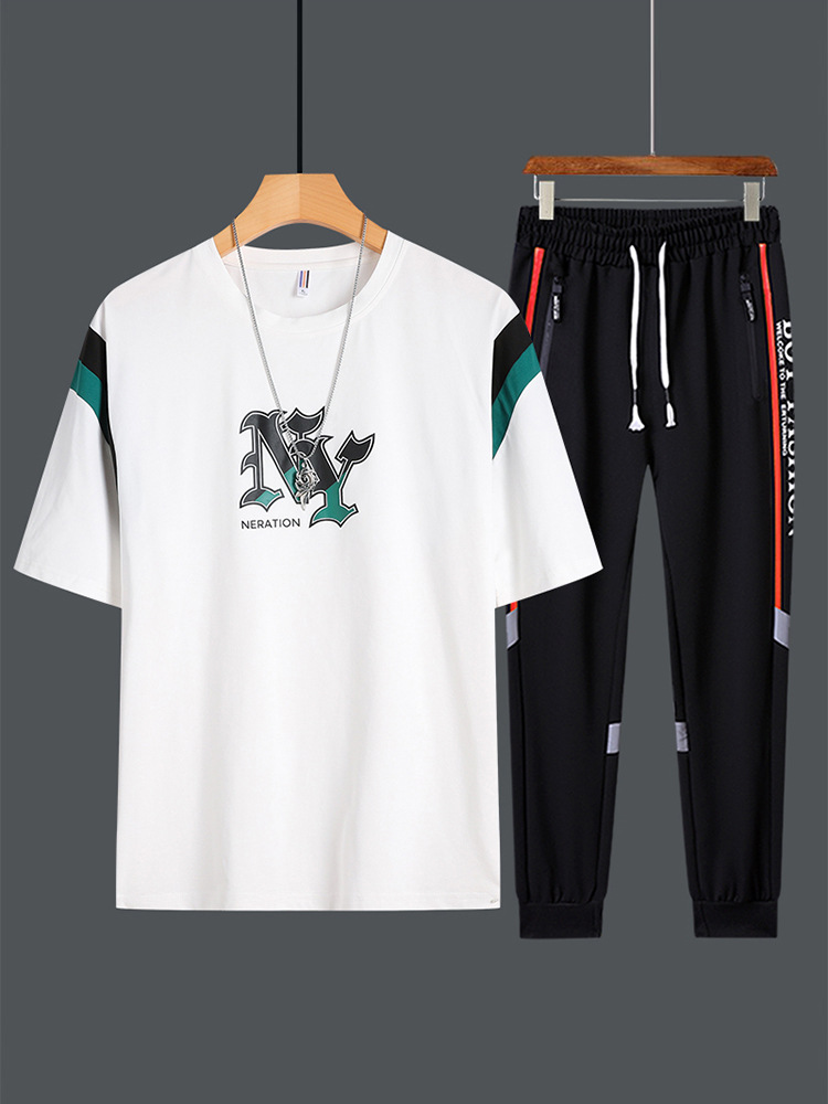 Set de mangas cortas para hombres de verano nuevo estilo de moda adolescente camiseta suelta con pantalones deportivos de tendencia casual de dos piezas