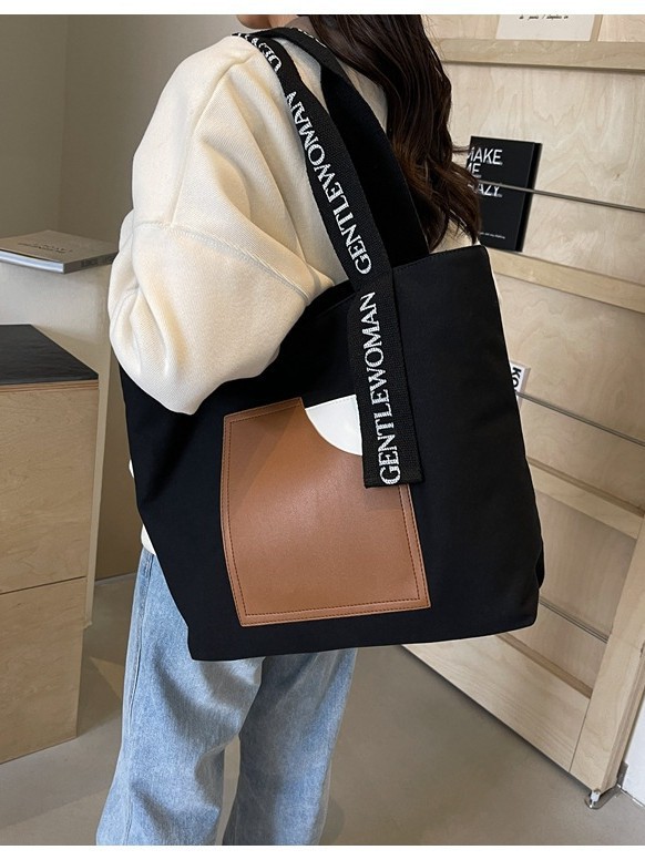 Fábrica directa tote bolsas de lona de niñas bolsas de hombro resistentes al desgaste simple letras impresión bolsas de comercio exterior transfronterizas