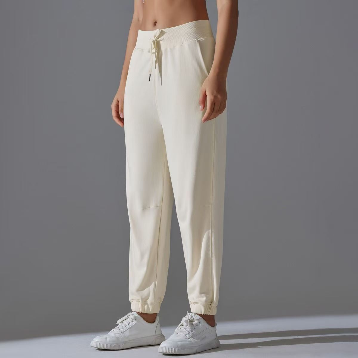Nuevos pantalones deportivos de alta elasticidad de tracción de ropa de mujer, pantalones de entrenamiento sueltos transpirables, pantalones de entrenamiento de nueve puntos