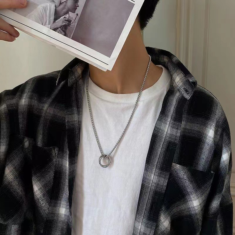 Collane in titanio da uomo di vendita calda, alla moda e personalizzate, doppi anelli ad incastro, olio gocciolante intarsiato_voghion.com