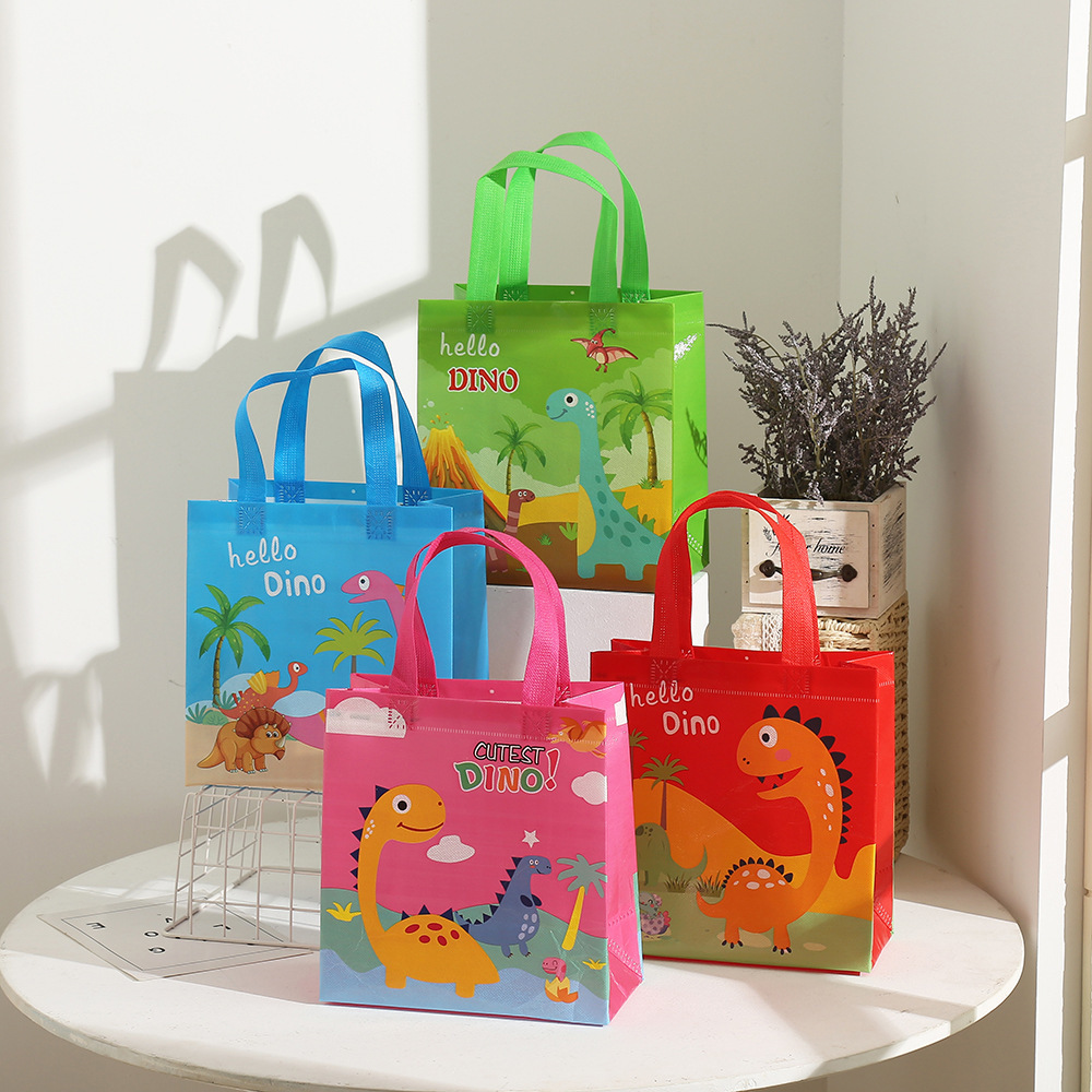 Bolsa de regalo pequeña para el Día del Niño, bolsa de regalo de tela no tejida con diseño de dinosaurio, bolsa de regalo para dulces de jardín de infantes