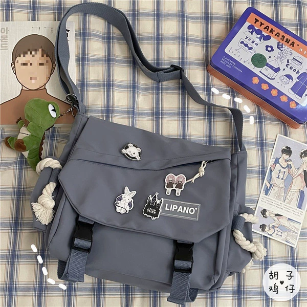 Blue badge, dinosaur, pendant
