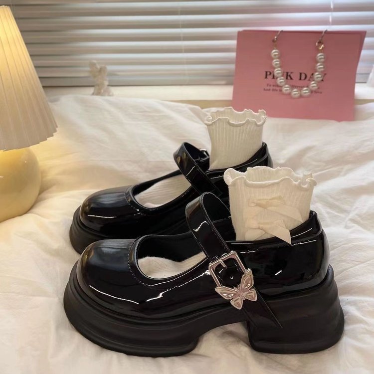 Zapatos de cuero franceses de Marizhen para mujeres 2025 primavera nueva cabeza negra redonda japonesa con suela gruesa de tacones altos retrógrados zapatos para mujeres