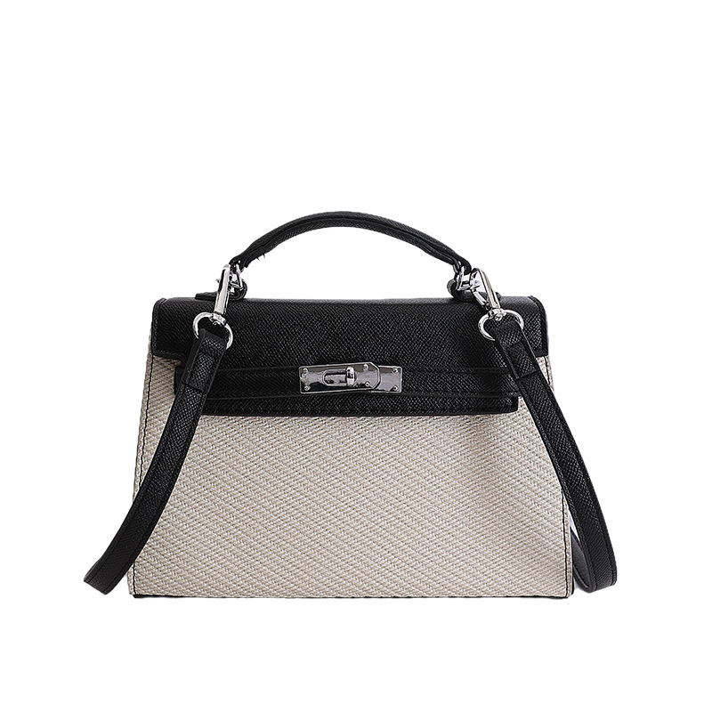 Textura de nicho bolso de diseño de mujer 2026 nuevo bolso Kylie color contraste diario simple viaje mochila de hombro