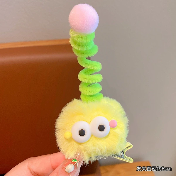 Yellow plush balls strange hair clip