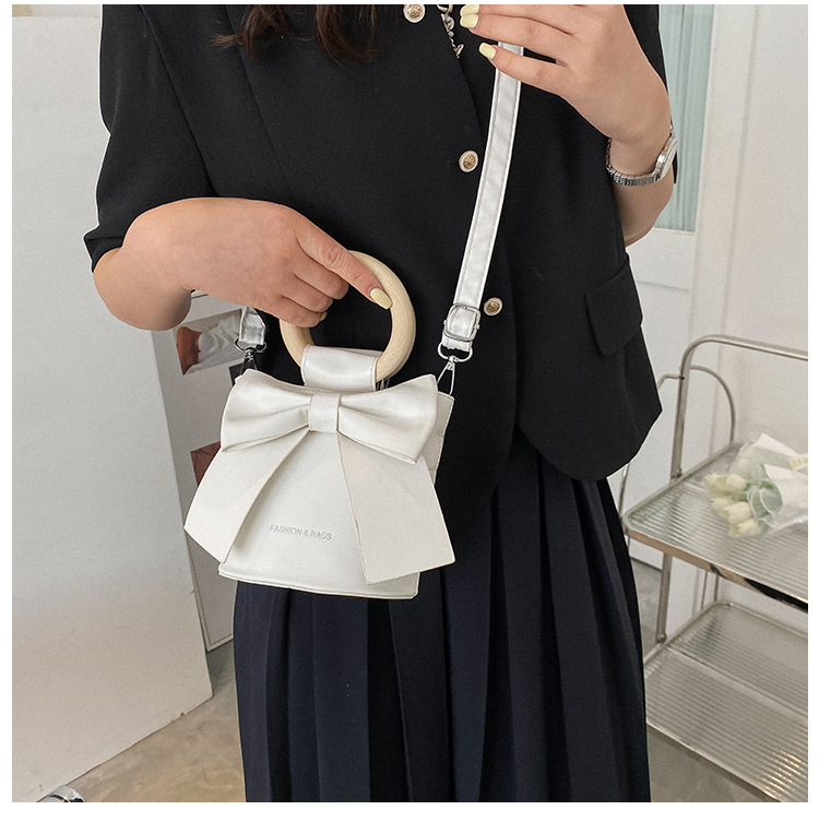 455g Weight Synthetic Leather Lining Material Sewing Thread Fashion Element Magnetic Buckle Closure Type Single Shoulder Strap, Double Handle Strap Type Bucket Bag Bags Type Casual Occasion Pu Leather Material Bow Knot Pattern All Seasons Season Women's Gender Elegant Style Bucket Shape Small Size Women's Small Pu Leather Bow Knot Elegant Sewing Thread Bucket Magnetic Buckle Bucket Bag 39