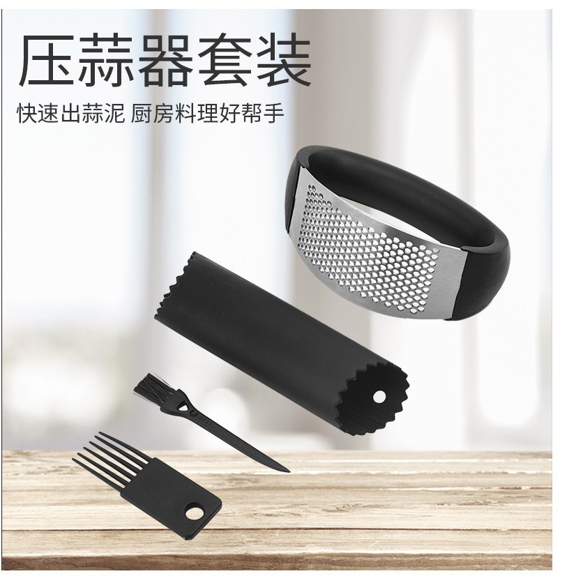 Multifuncional de tres piezas de cuatro piezas de silicona peeling removedor de ajo cepillo de limpieza anillo manual prensa de ajo gadget