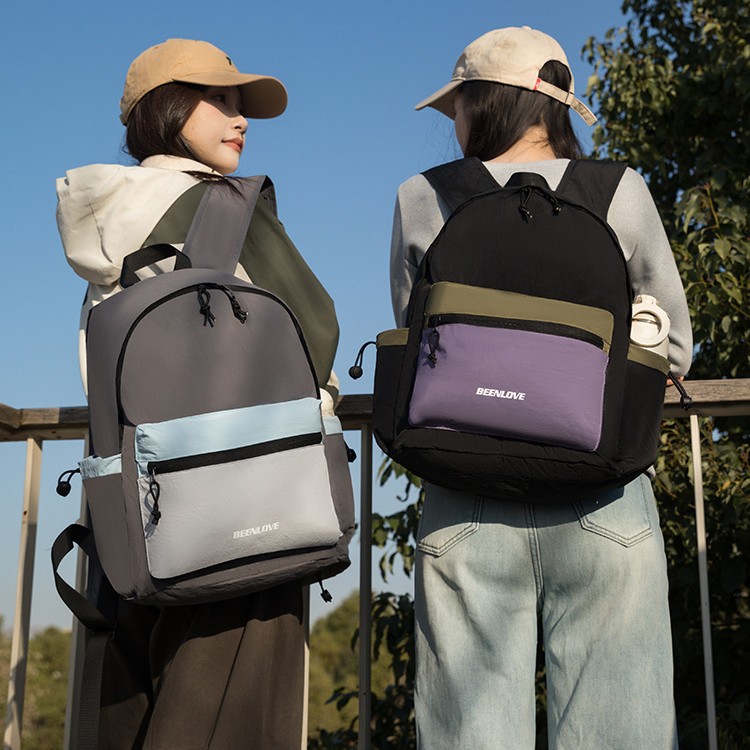 Diseño de contraste de color sensación de deporte al aire libre torre de sillo plegable mochila a prueba de agua de senderismo bolsa de montaña bolsa de estudiantes universitarios
