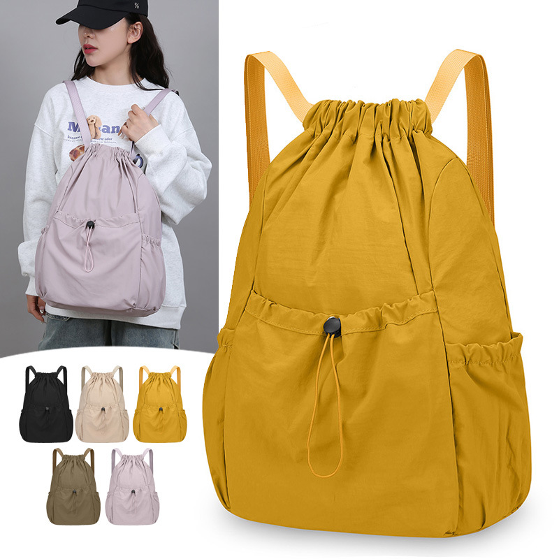 Mochila de cuerda ligera comercio exterior mochila al aire libre coreana de gran capacidad de mujeres viajes viajeros ociosos bolsa al por mayor