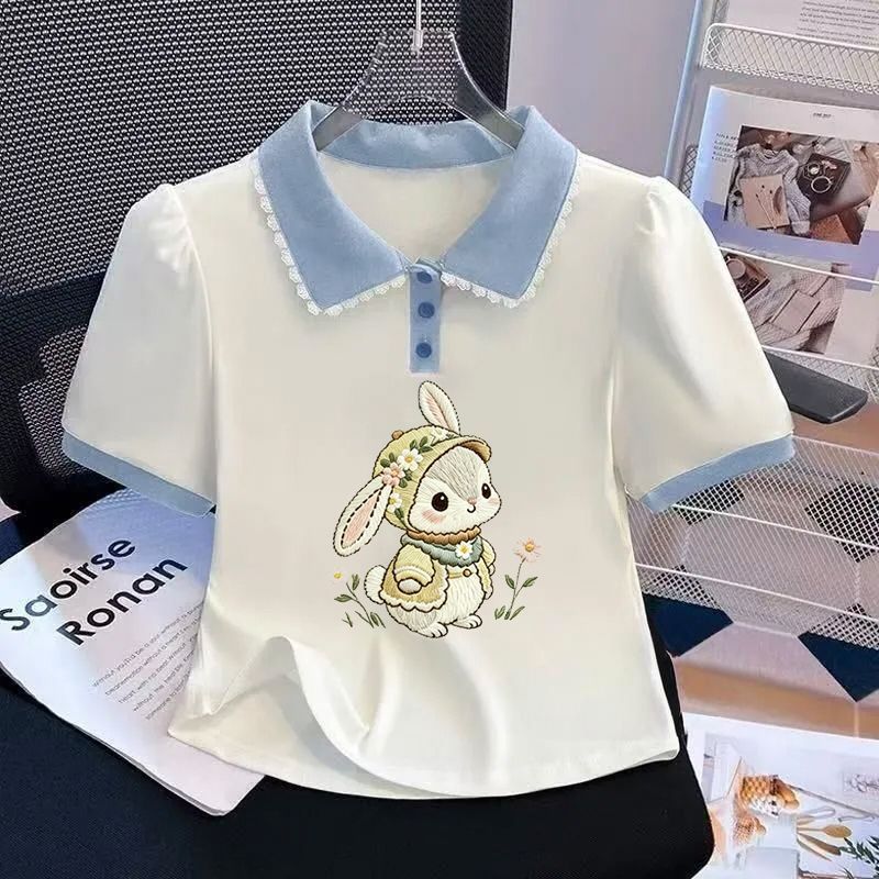 Girls' short-sleeved polo shirt with lace trim, stylish and versatile for summer 2026.