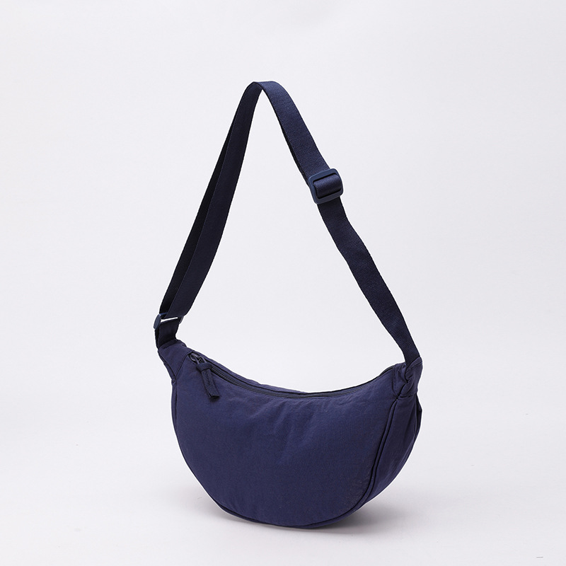 Bolso de tela pequeño bolso de moda ligero bolso de mochila de nylon transfronterizo mujer bolso de hombro casual versátil bolso de bolsas de bolsas de bollo de gran capacidad