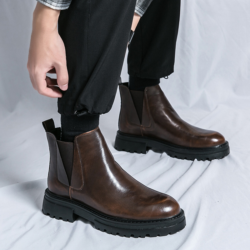 Otoño y invierno nuevos hombres casuales de moda gruesa botas Martin para hombres estilo británico coreano de alto soporte para aumentar la altura de botas cortas lotes