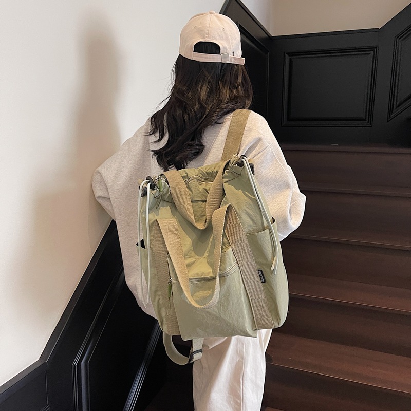 2025 새로운 스타일의 발수 배낭, 심플한 대용량 배낭, 패셔너블하고 가벼운 휴대용 학생 배낭, 대용량