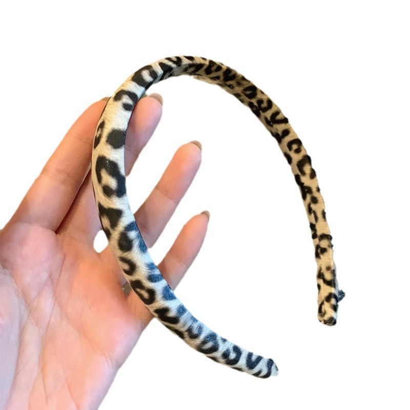 Nuevo estilo coreano de alta calidad estampado de leopardo hermoso banda de tela esponja textura de moda banda de cabeza de cráneo alto accesorios para el cabello