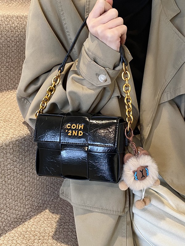 Bolso tejido de cuero de cera de aceite de alta calidad para mujer 2025 primavera nueva moda casual bandolera de moda de nicho