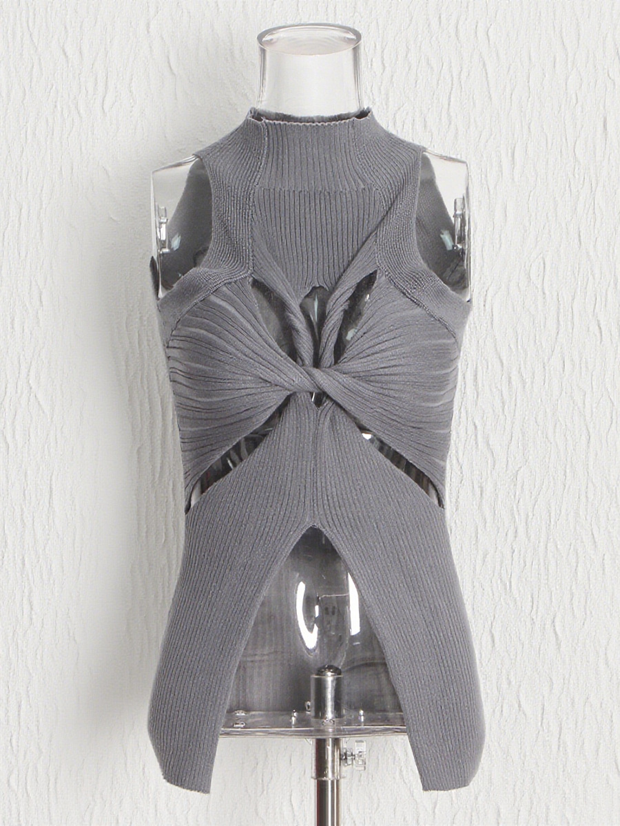 Chaleco de estilo casual y sexy europeo y americano para mujer, nuevo estilo 2026, cuello alto, sin mangas, diseño asimétrico con aberturas, top de punto.