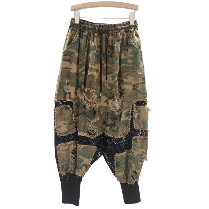 Personalidad nicho moda mujer 2025 verano nuevo estilo malla hueca costura nueve puntos camuflaje pantalones de entrepierna