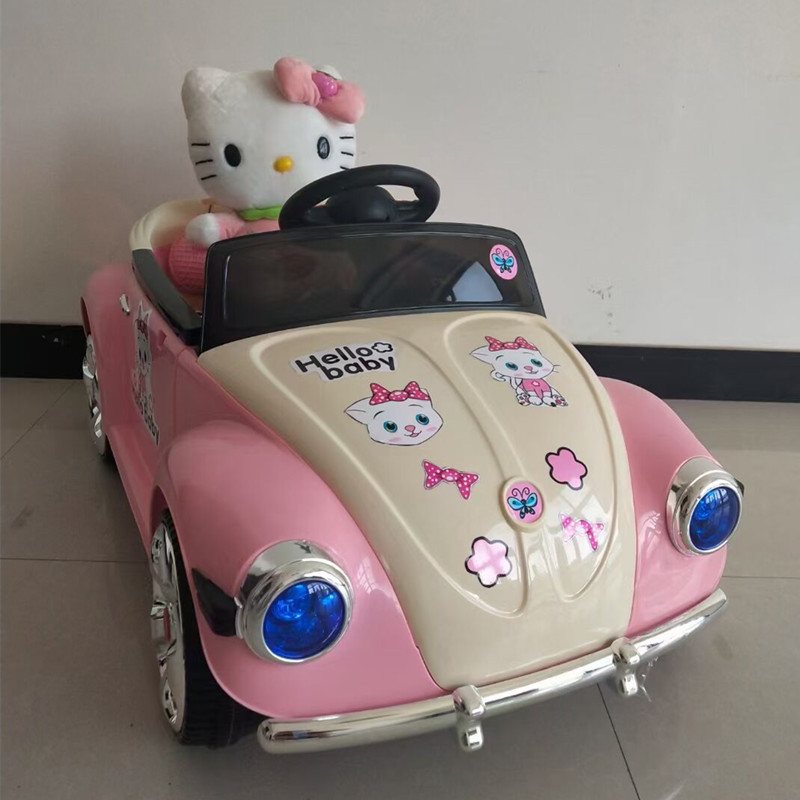 Nuevo coche eléctrico para niños Lindo coche de princesa de cuatro ruedas de control remoto coche eléctrico portátil cochecito de juguete para niños