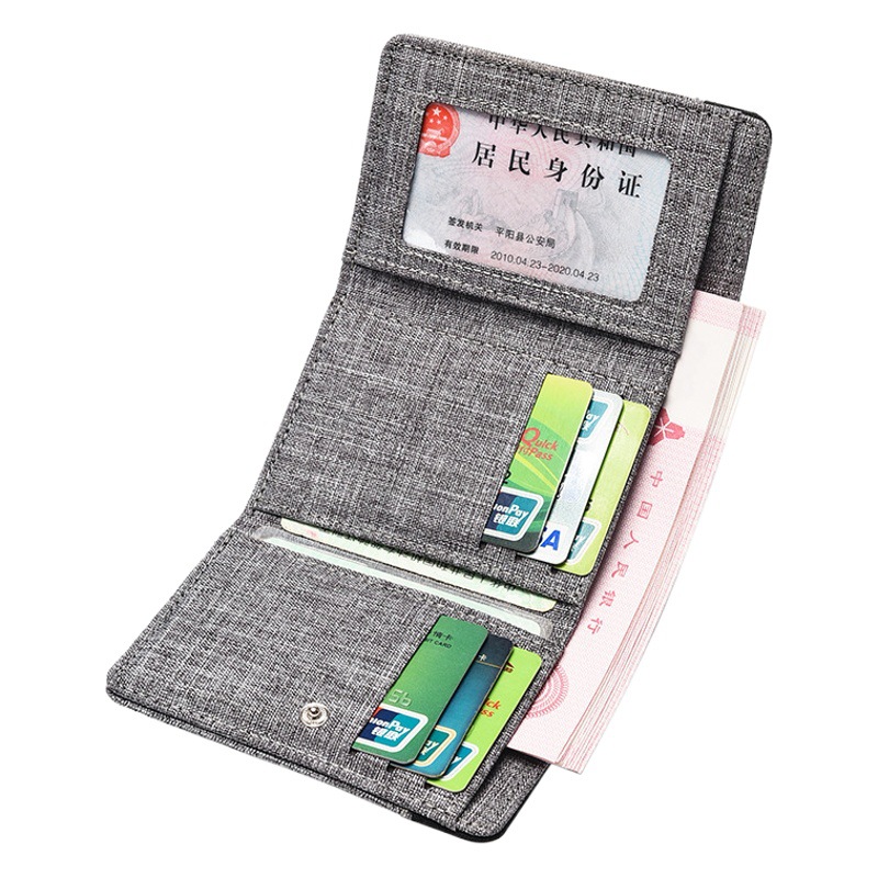 2022 nueva cartera de lona de los hombres marca de moda corta cartera multi-tarjeta de moda retro estilo coreano tríptico pequeña cartera de moda