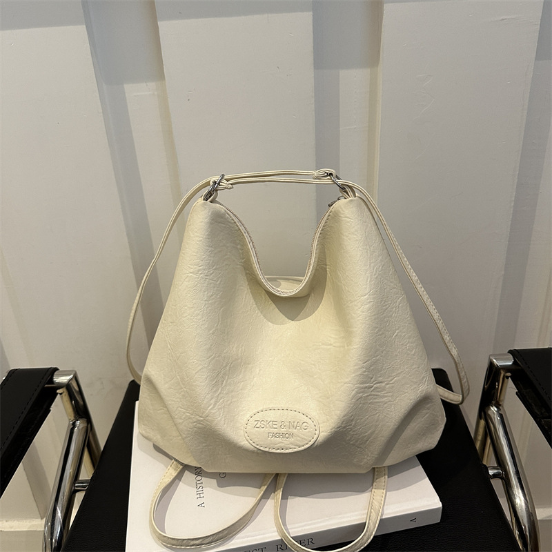 Gran capacidad de transporte popular ocio 2024 retro nuevo estilo de tendencia de color sólido multifuncional bolso de hombro para mujer