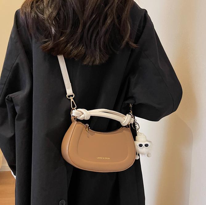 Bolso simple estilo explosivo de comercio exterior para mujer 2025 nuevo bolso de hombro casual salvaje textura bolso de mensajero de alta gama de moda