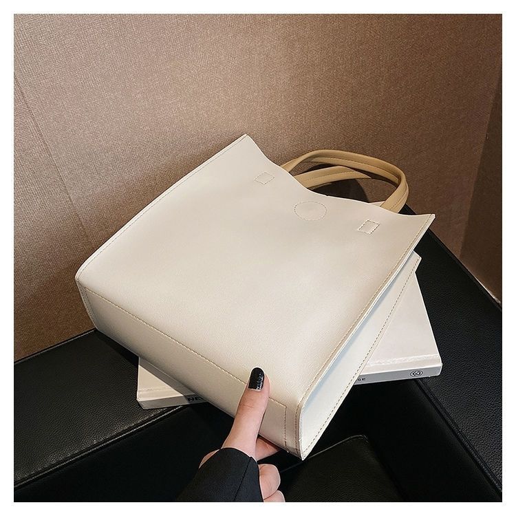 2024 New Bags Korean Version Versatile Commuting Bags Large Capacity Portable Tote Bag Temperament Popular Women’s Bag Vertical Style_voghion.com