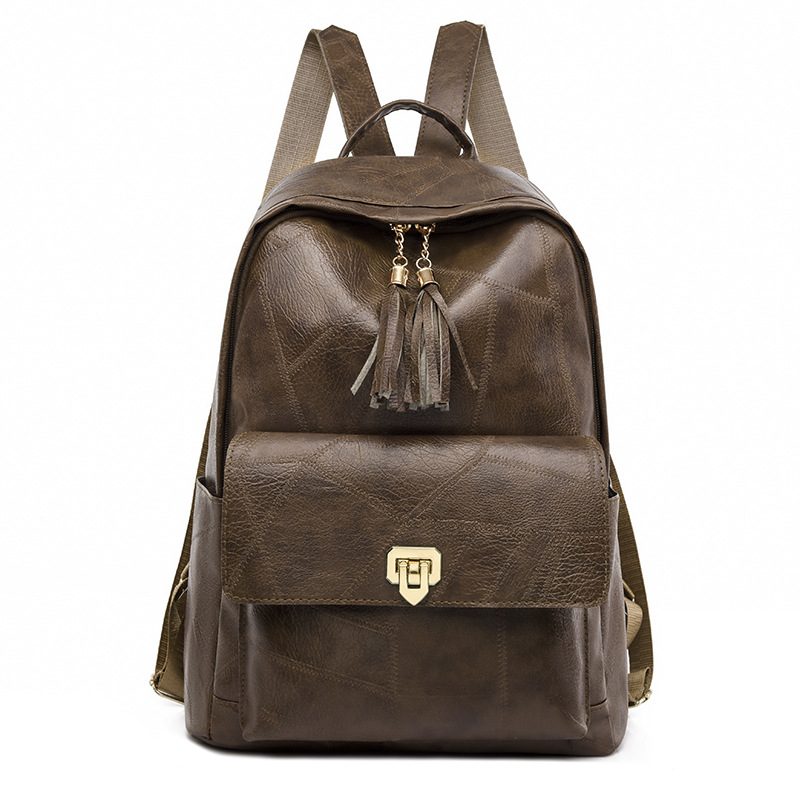 Comercio exterior al por mayor 2023 nueva mochila de PU para mujer retro simple y versátil color sólido de gran capacidad mochila para exteriores marea