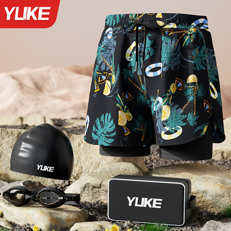 Black and blue four-piece set (swimming trunks + silicone cap + swimming goggles + bag)