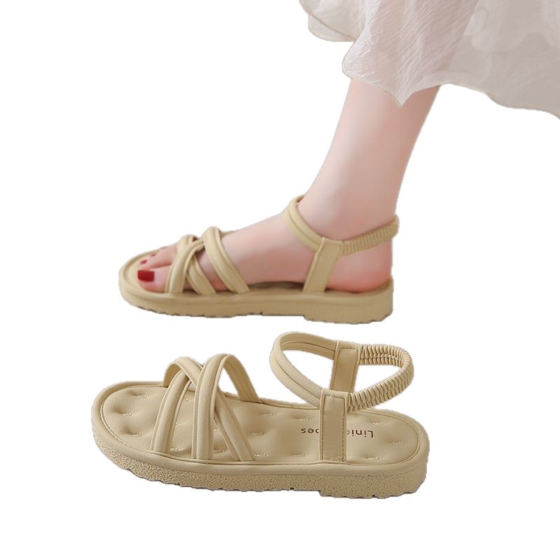 Estilo de hadas cómodas sandalias planas suaves para mujer 2025 verano nuevo estilo casual punta abierta zapatos de playa suaves zapatos de mujer