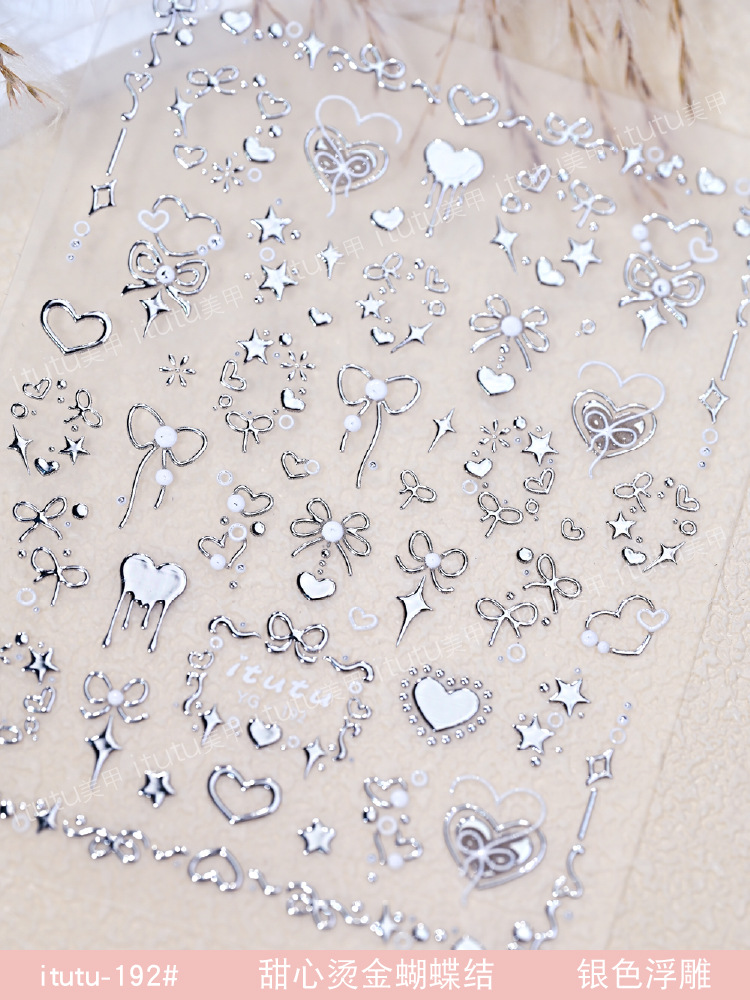 Nuevo dulce arco estampado en relieve pegatinas de uñas rosa arco amor arco estampado en plata pegatinas de corazón de桃ar rojo