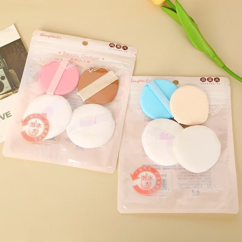 Polvo de cojín de aire con bolsa de almacenamiento huevo de maquillaje redondo dos conjuntos de polvo de marshmallow seco y húmedo al por mayor