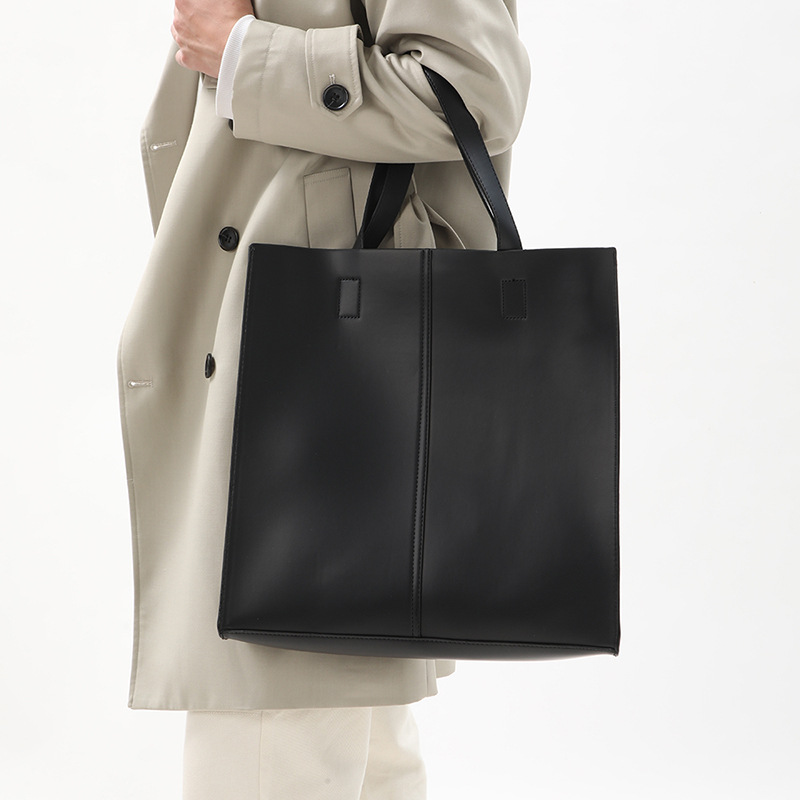 Korean version of fashionable PU leather shoulder bag, simple commuter men's and women's tote bag, square vertical crossbody large-capacity handbag_voghion.com