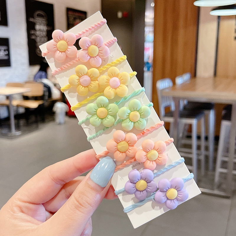 Los niños de la banda del pelo del bebé de la historieta no lastiman la banda de goma del pelo de la niña volumen del pelo menos cuerda del pelo del bebé