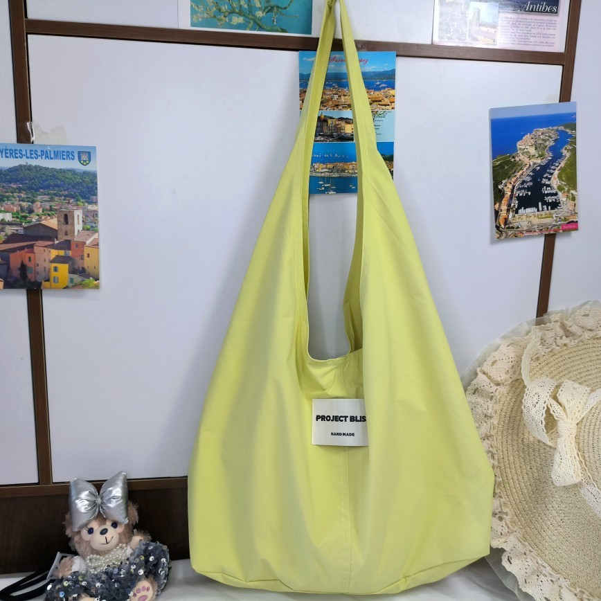 한국 틈새 디자인 환경 친화적 인 천 가방 도파민 색상 경량 어깨 통근 천 가방 캐주얼 대용량 운반 가방