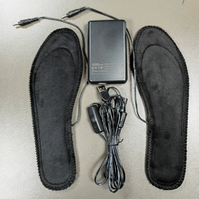 Уличная обувь? Но текст: "Outdoor diligence USB heating insole EVA can cut electric heating insoles USB heating insole switch control"