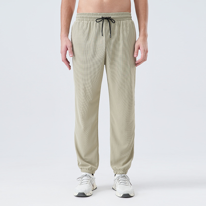 Pantalones deportivos de tejido para hombres respirantes absorbientes de humedad secado rápido entrenamiento de maratón de atletismo para correr pantalones casuales