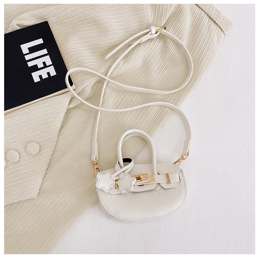 2025 primavera y verano estilo caliente moda casual niños dulces bolsa de gelatina mini bolso de mensajero de un solo hombro variedad al por mayor
