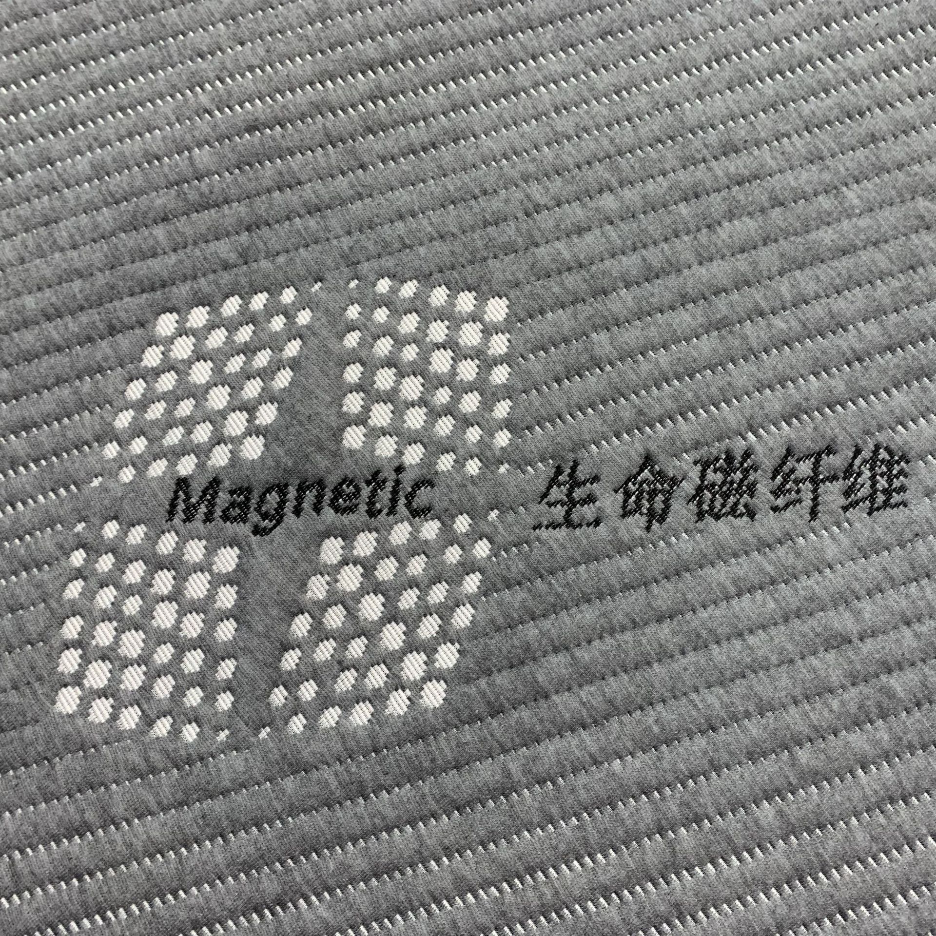 Los fabricantes suministran 180g de tela de colchón gris cáñamo con tela funcional de colchón jacquard de punto de fibra magnética de vida