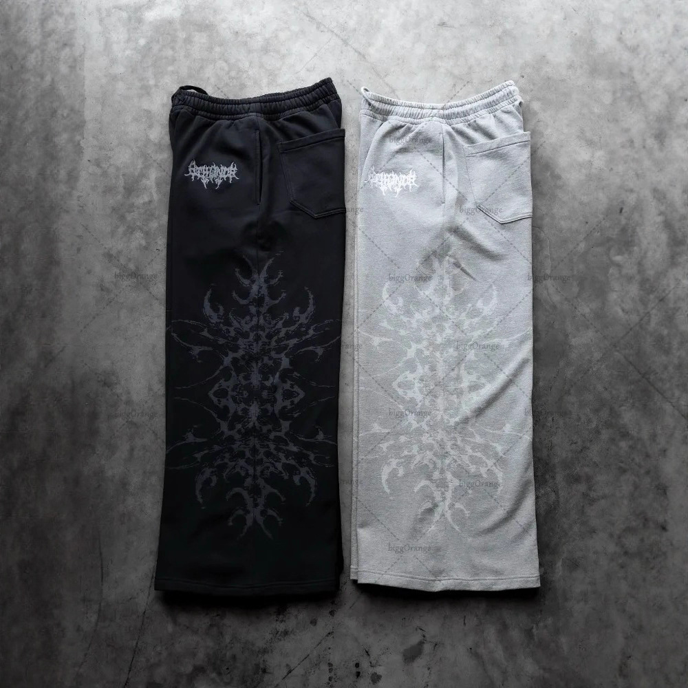 Europa y Estados Unidos transfronterizos estadounidenses tendencia hip-hop personalidad callejera pull-out pantalones casuales de moda impresa pantalones rectos sueltos
