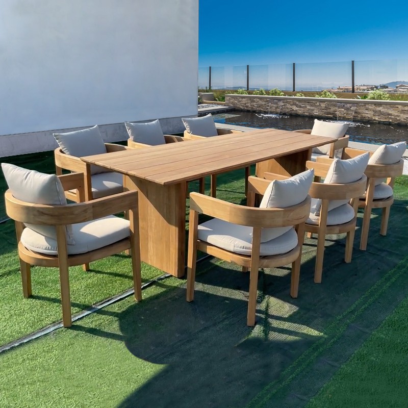 Solid wood dining table and chairs made from weather-resistant teak with an aged finish, perfect for outdoor patios, villas, gardens, and leisurely outdoor gatherings.