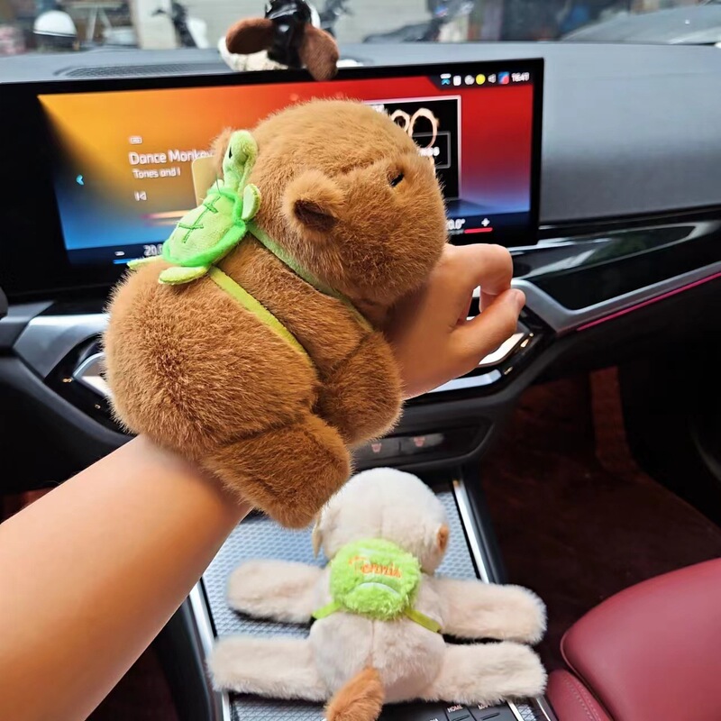 現物のカピバラのぬいぐるみのぬいぐるみの水のモルモットのブレスレットのカピバラのしっぽはパチパチと回転します。|undefined