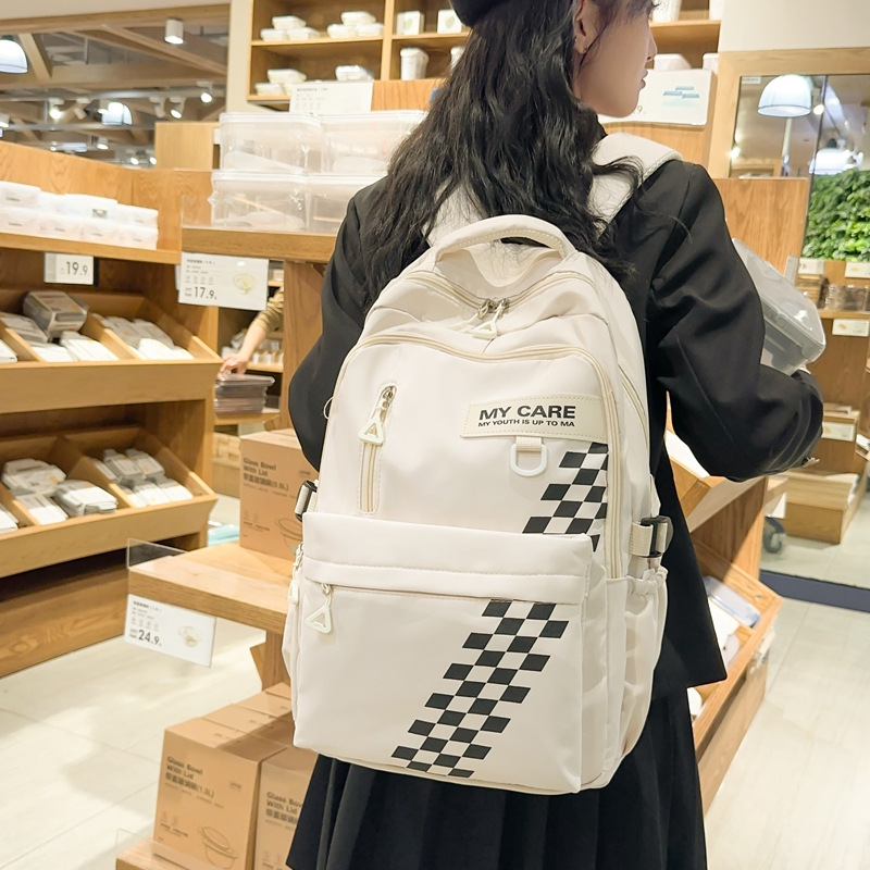 Mochila escolar transfronteriza masculina mochila de estudiante de secundaria para reducir la carga de gran capacidad mochila de computadora de 15,6 pulgadas hembra