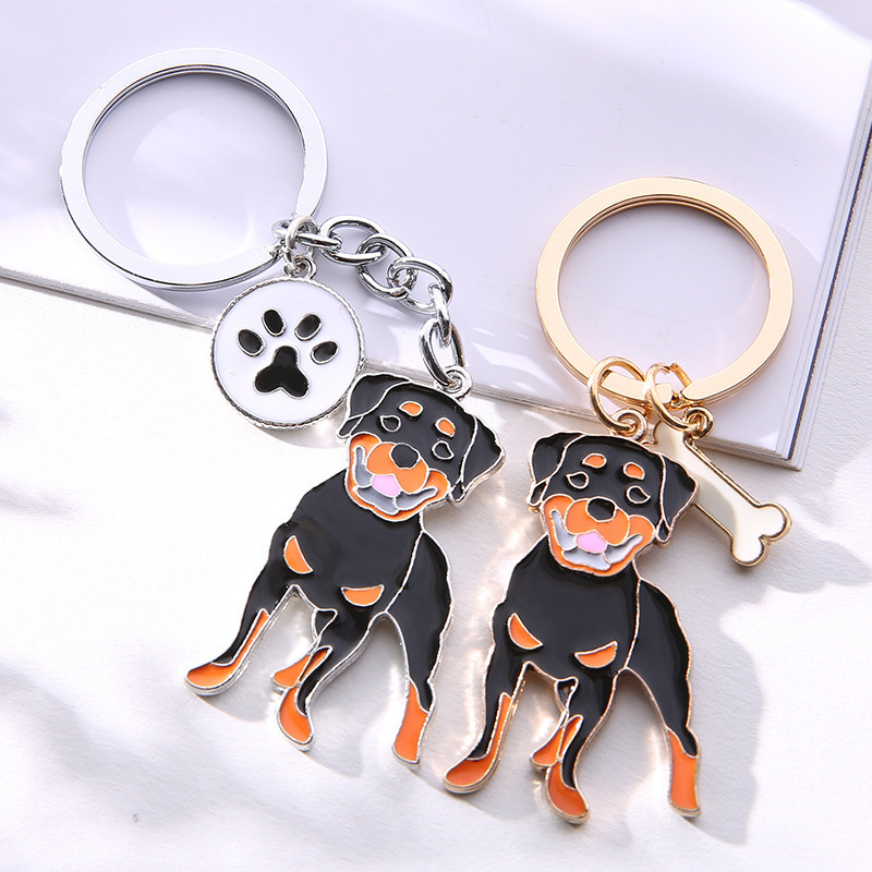 Tiktok popular Rowena metal keychain pendant pet dog bone foot jewelry creative holiday small gift