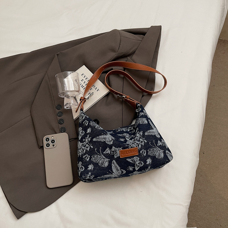 2024 nuevo bolso de viaje de mezclilla casual de gran capacidad con estampado de todo fósforo para mujer bolso de axila de un solo hombro